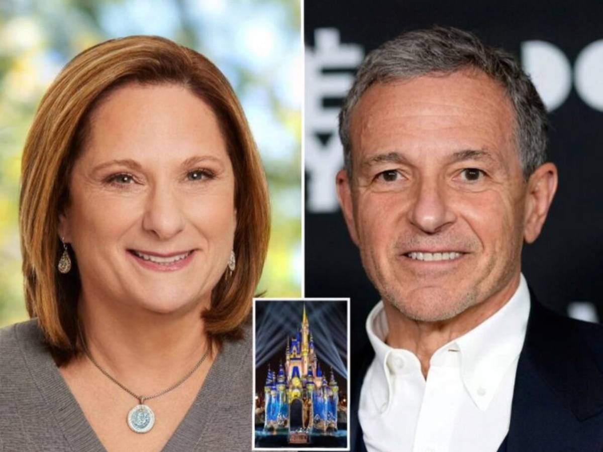 Susan Iger and his wife, standing together and smiling at a formal event.